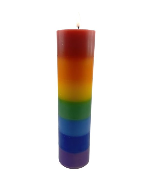 7-Layer chakra pillar candle with seven stacked colour bands – red, orange, yellow, green, blue, indigo and violet – standing upright on a neutral background.